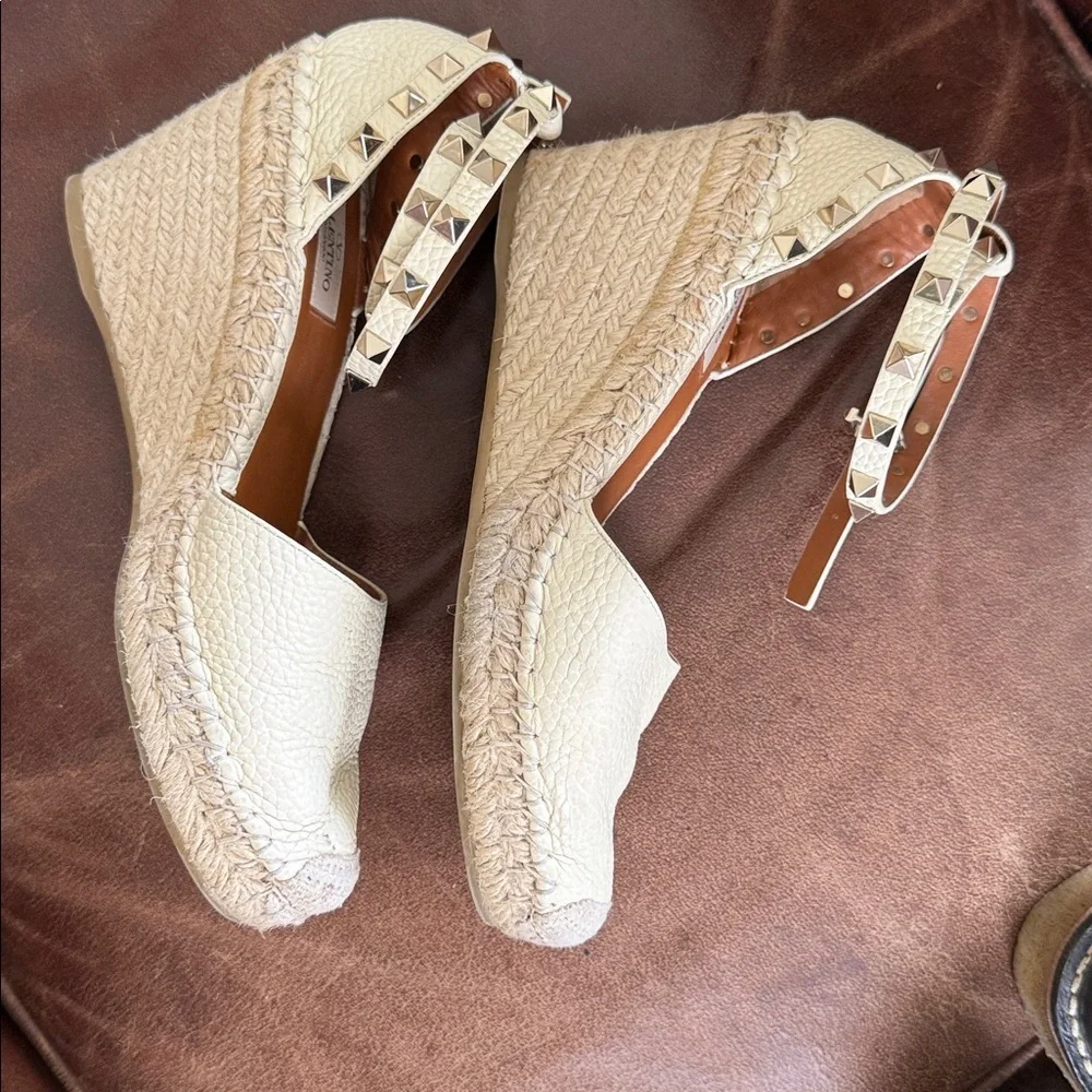 These are Valentino Garavani Rockstud textured-leather espadrille wedge heel